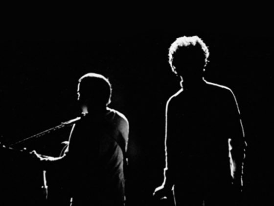Simon-and-Garfunkel-on-stage-in-silhouette_billboard